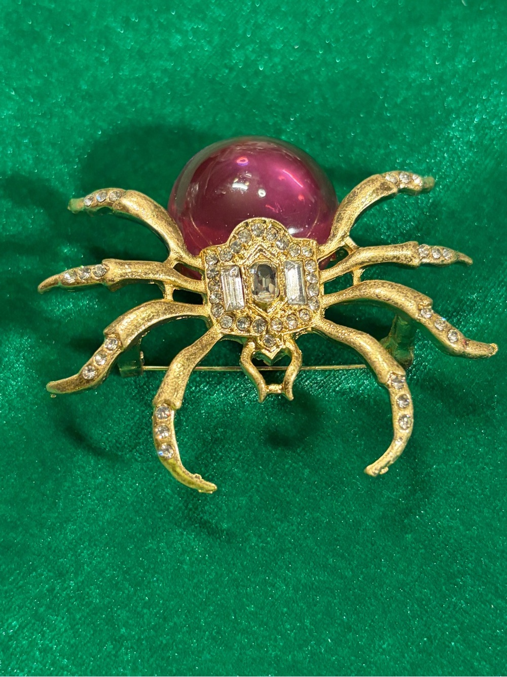 Gold-Tone Spider Brooch with Purple Cabochon
